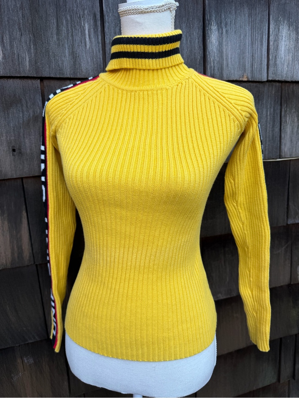 Vintage Y2K yellow knit sweater turtleneck logo band UNIF sz XS.